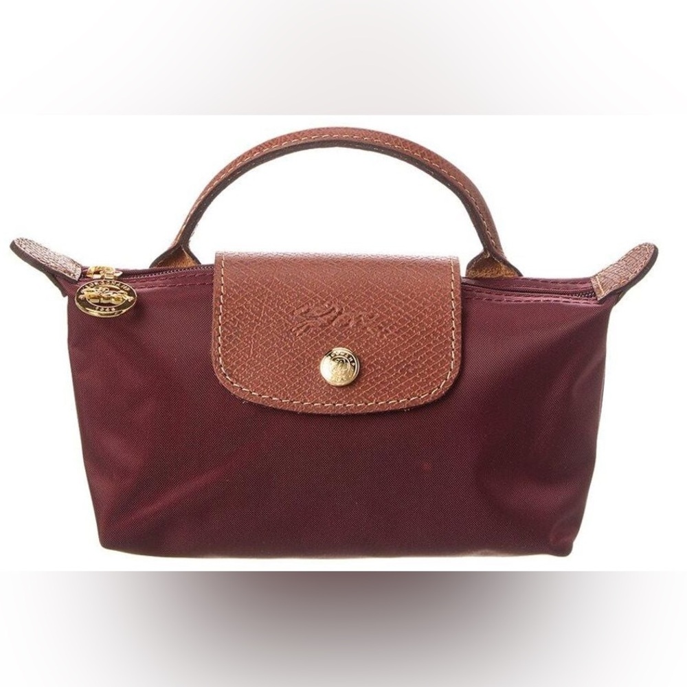 Brand new Longchamp Mini Pouch in burgundy